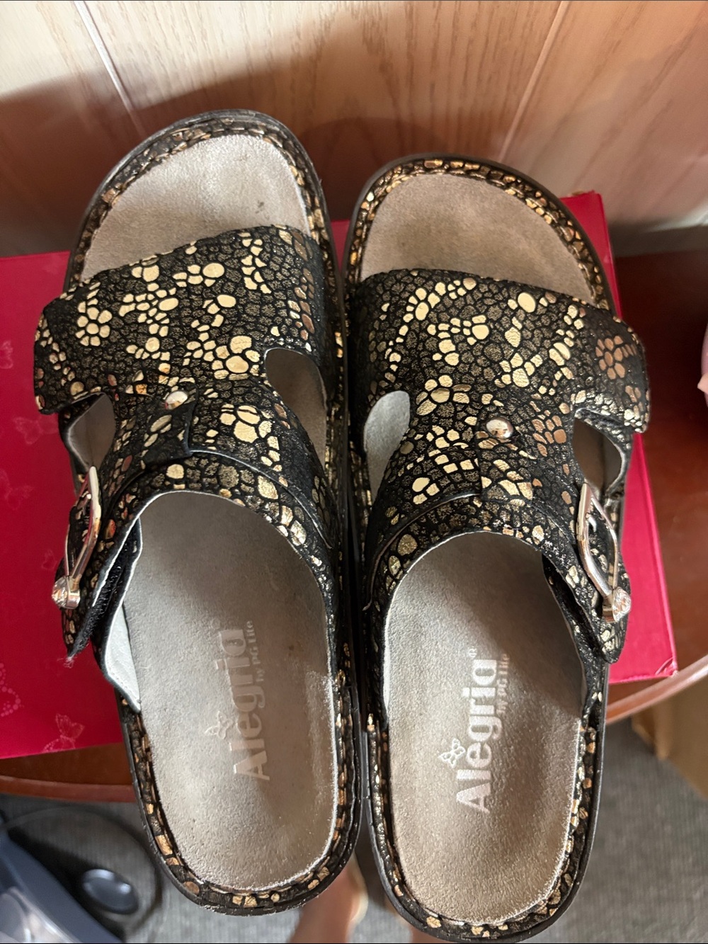 Alegria Black Slip-On Clogs with Gold Floral Accents